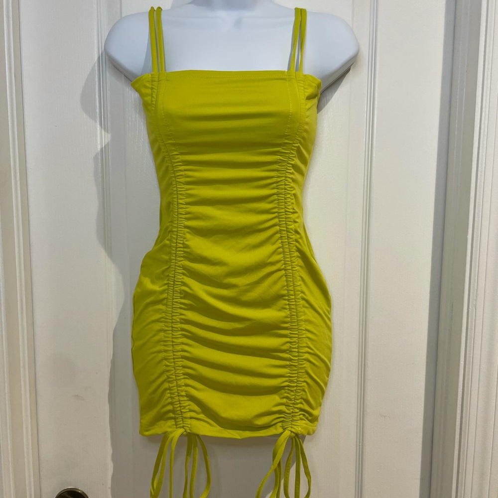 Bright green bow mini dress
